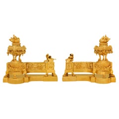 pair of French 19th century Louis XVI st. Ormolu andirons
