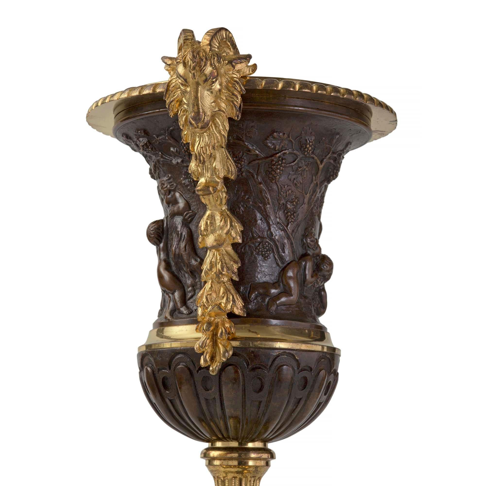 Pair of French 19th Century Louis XVI St. Ormolu, Bronze and Granite Urns For Sale 1