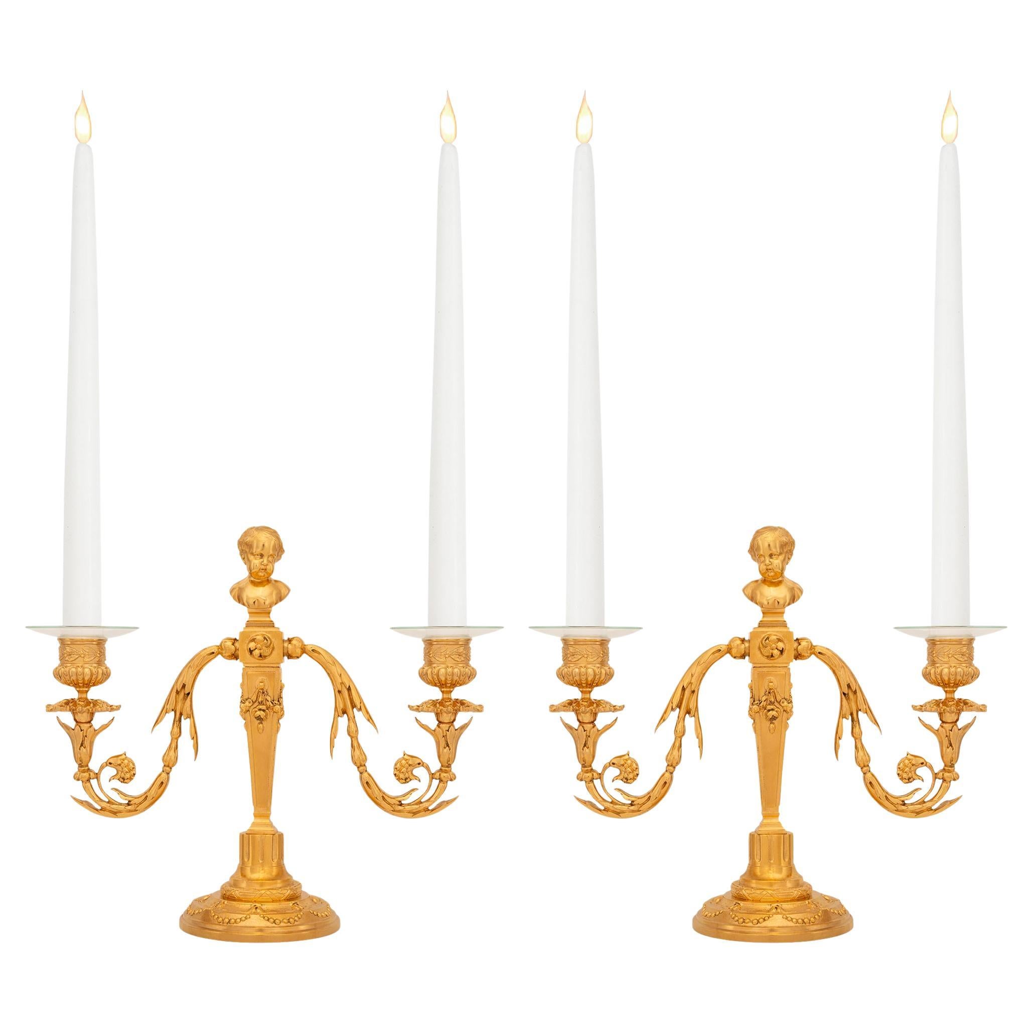 pair of French 19th century Louis XVI st. Ormolu candelabras