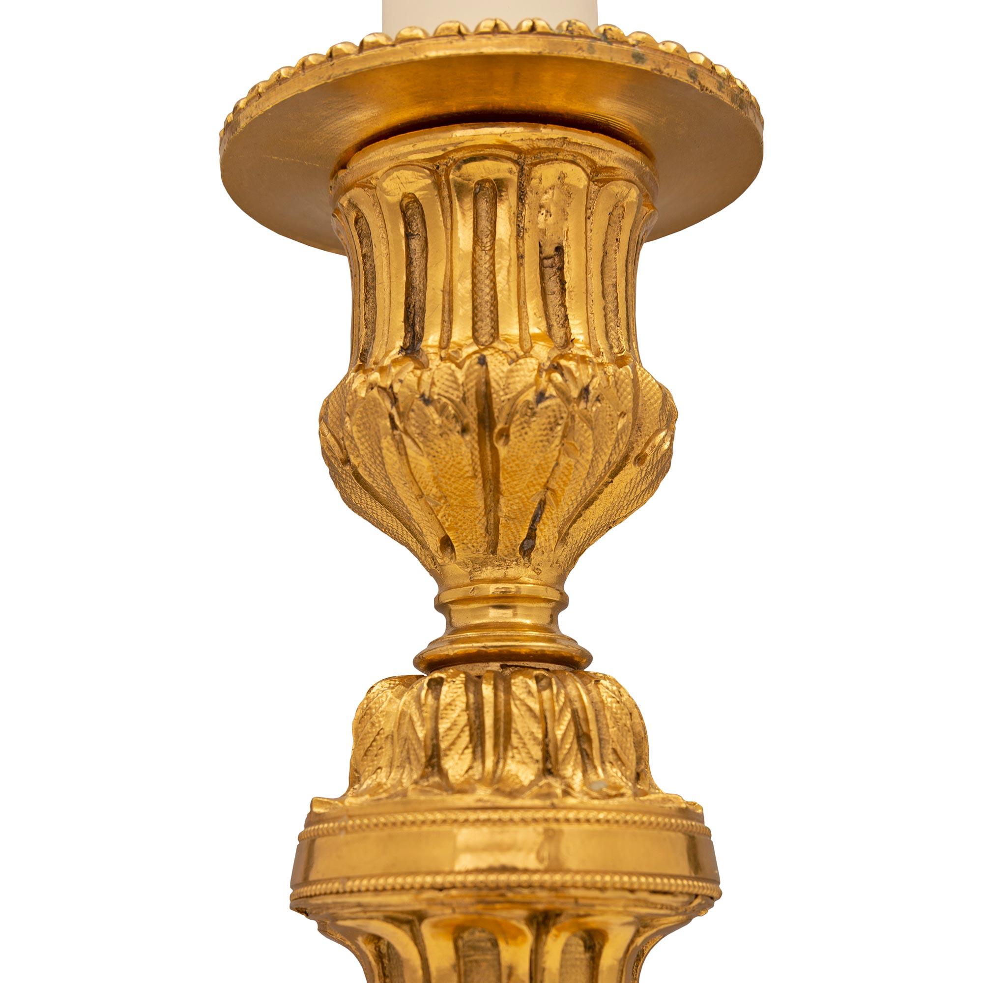 Belle Époque Pair of French 19th Century Louis XVI St. Ormolu Candlestick Lamps