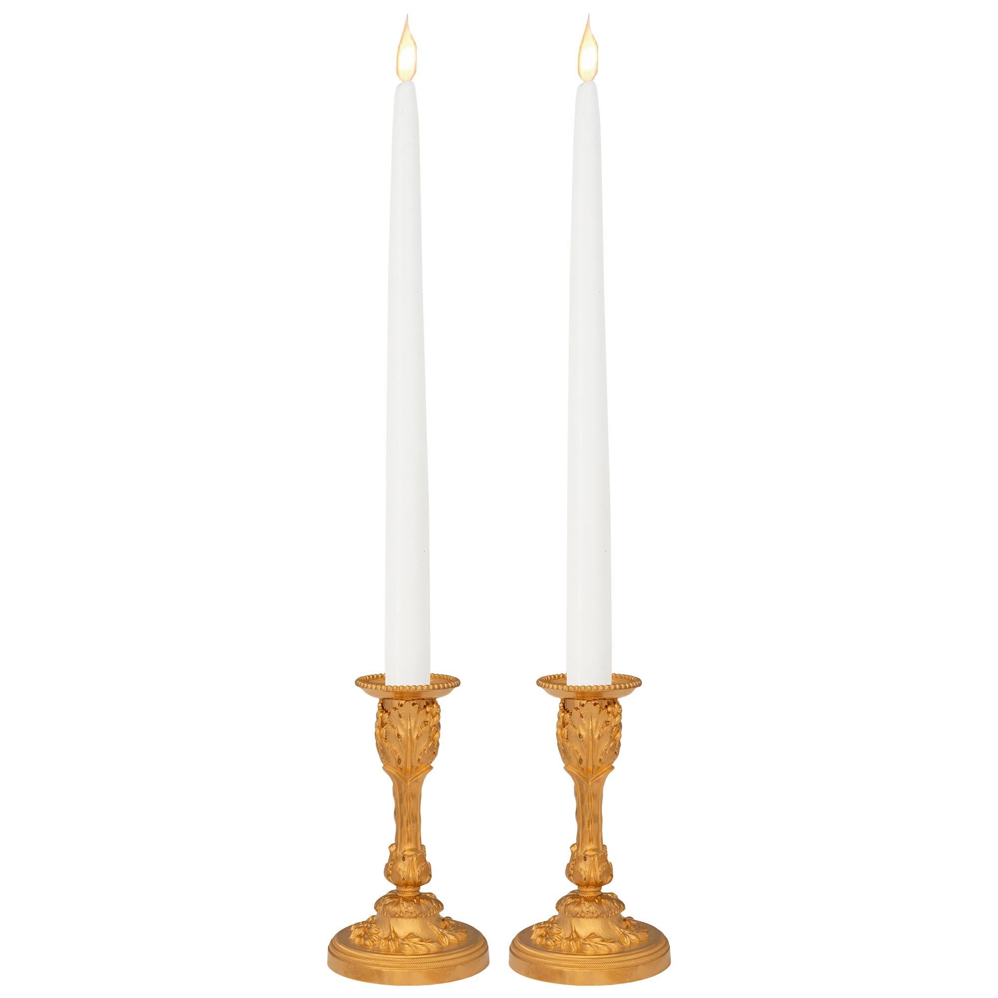 Pair of French 19th Century Louis XVI St. Ormolu Candlesticks 4