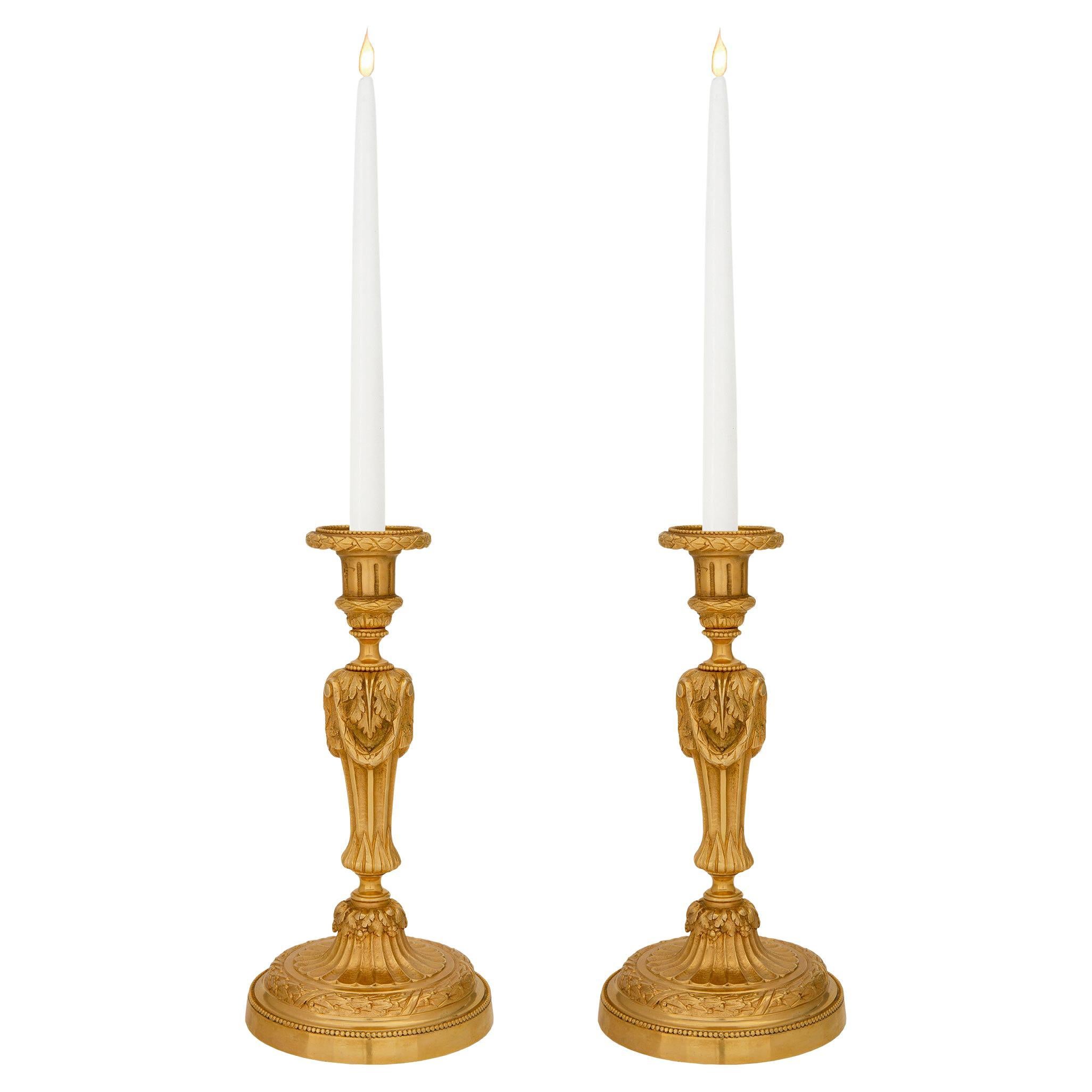 Pair of French 19th Century Louis XVI St. Ormolu Candlesticks