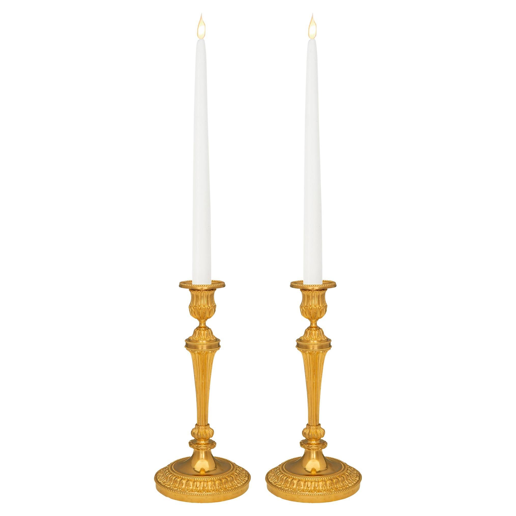 Pair of French 19th Century Louis XVI St. Ormolu Candlesticks