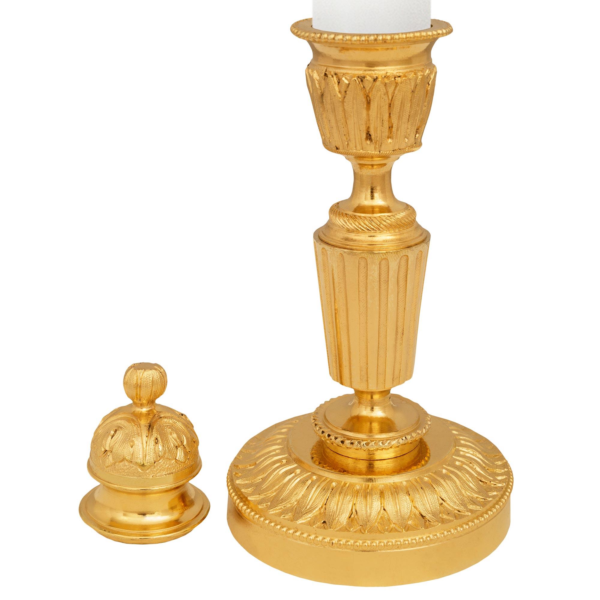 pair of French 19th century Louis XVI st. Ormolu cassolette candlesticks In Good Condition For Sale In West Palm Beach, FL