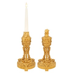 pair of French 19th century Louis XVI st. Ormolu cassolette candlesticks