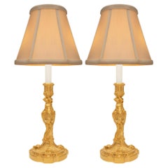 Paire de lampes en bronze doré Louis XVI du XIXe siècle