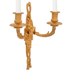 Pair of French 19th Century Louis XVI St. Ormolu Sconces