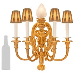 pair of French 19th century Louis XVI st. Ormolu sconces