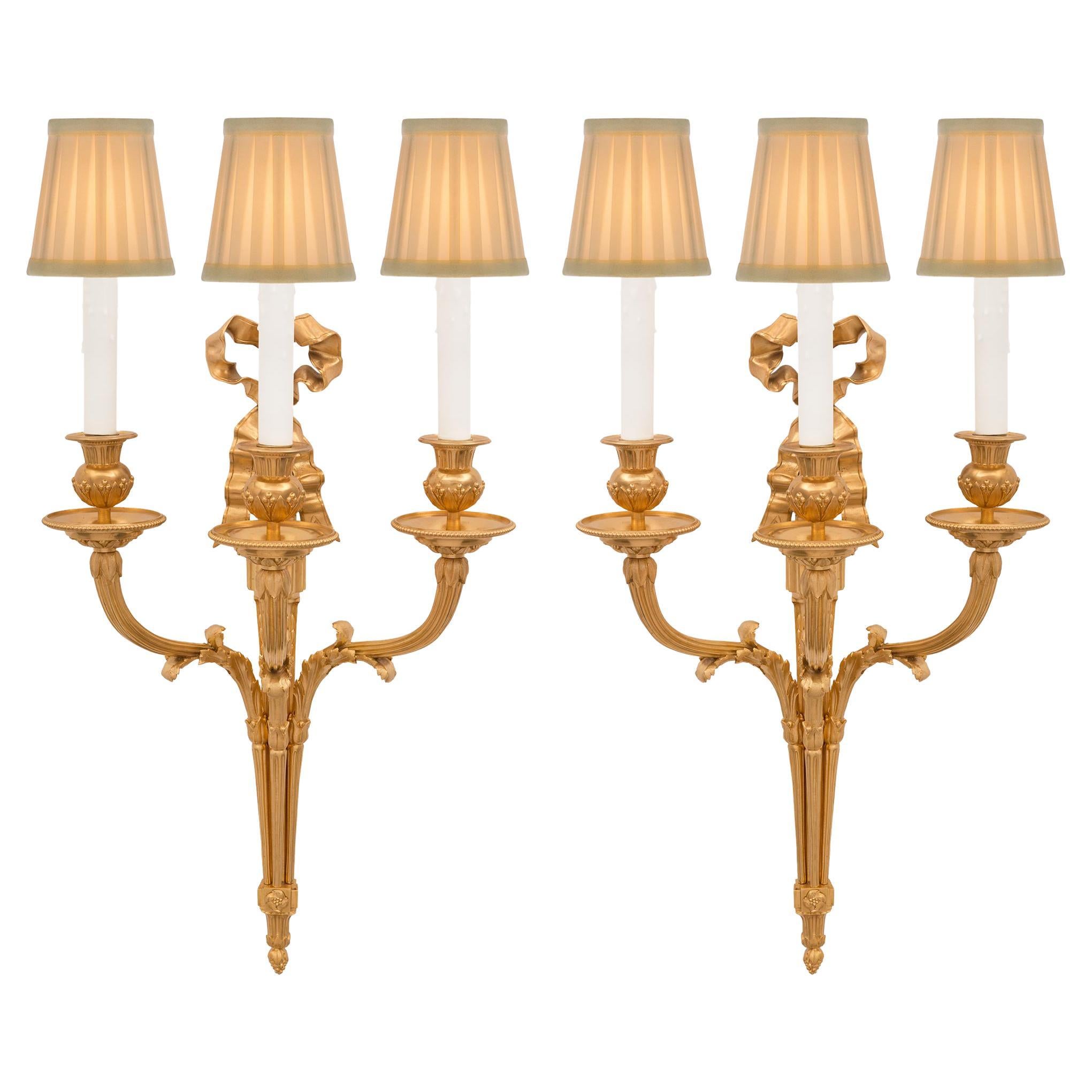 Pair Of French 19th Century Louis XVI St. Ormolu Sconces For Sale