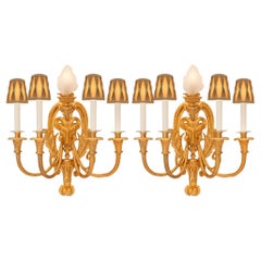 pair of French 19th century Louis XVI st. Ormolu sconces