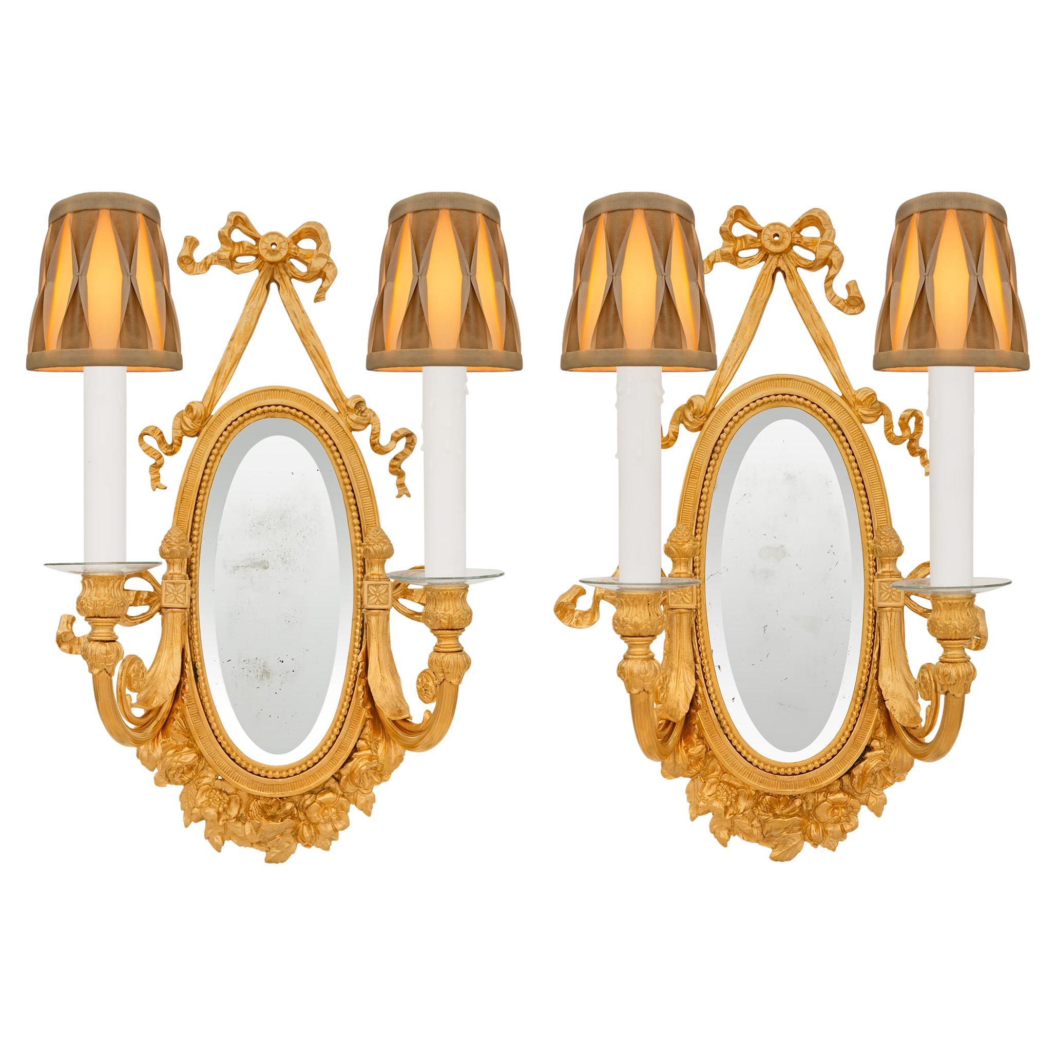 pair of French 19th century Louis XVI st. Ormolu sconces For Sale