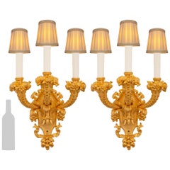 pair of French 19th century Louis XVI st. Ormolu sconces, stamped Caldwell & Co.