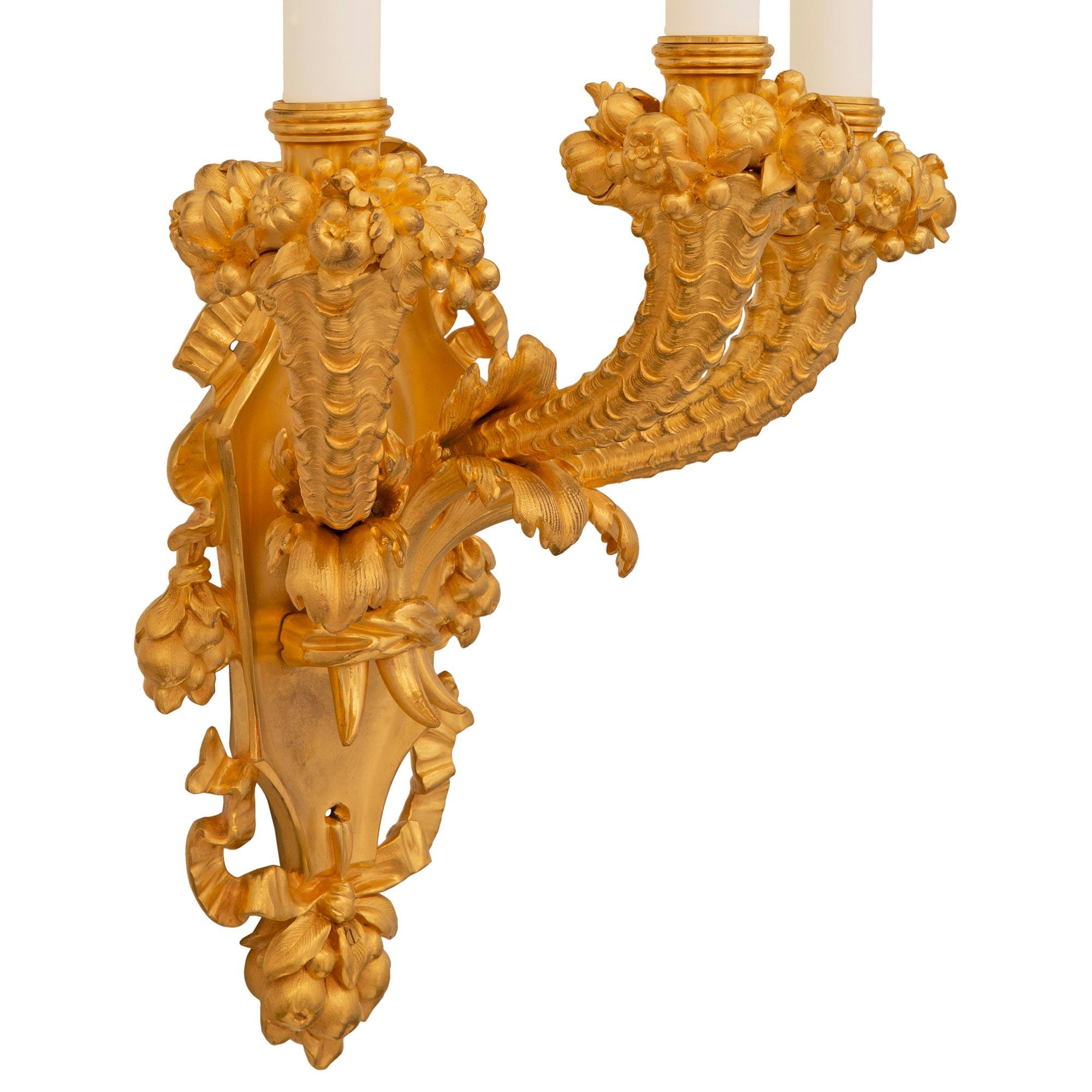 pair of French 19th century Louis XVI st. Ormolu sconces, stamped Caldwell & Co. In Good Condition For Sale In West Palm Beach, FL