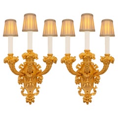 Antique pair of French 19th century Louis XVI st. Ormolu sconces, stamped Caldwell & Co.