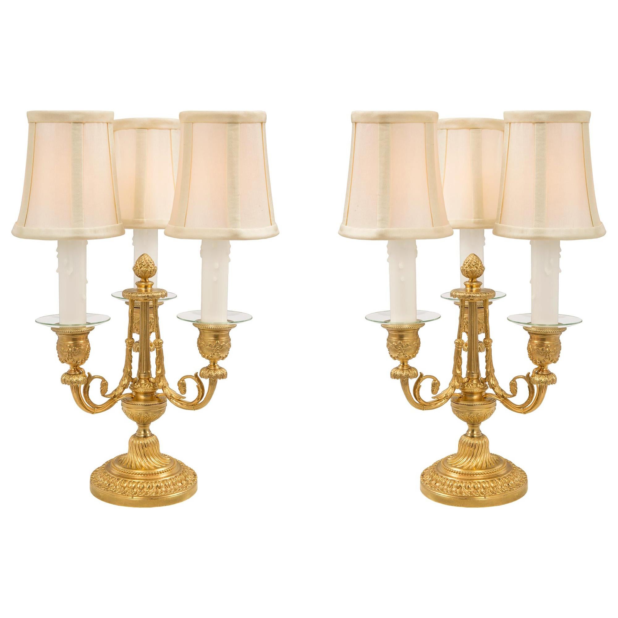 Pair of French 19th Century Louis XVI St. Ormolu Three Arm Candelabra Lamps