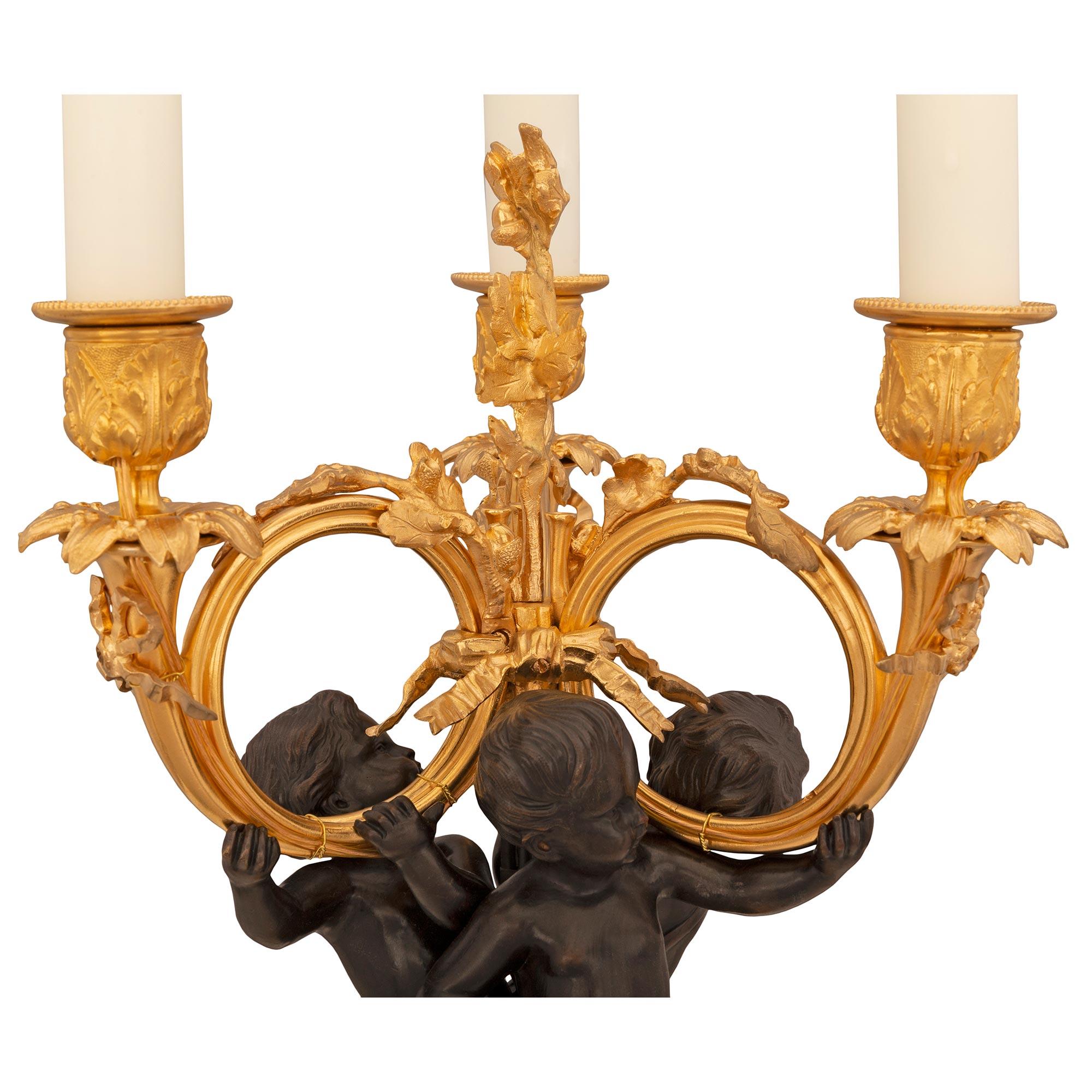 Pair of French 19th Century Louis XVI St. Patinated Bronze and Ormolu Lamps For Sale 1