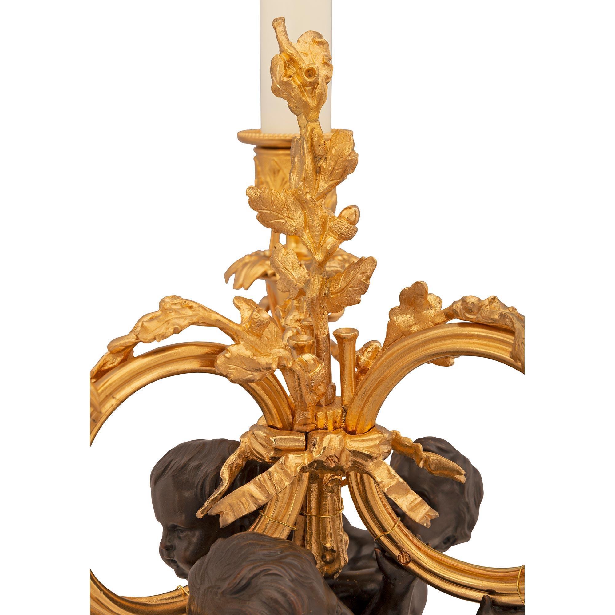 Pair of French 19th Century Louis XVI St. Patinated Bronze and Ormolu Lamps For Sale 2