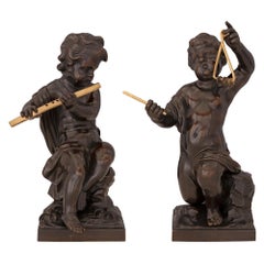 Pair of French 19th Century Louis XVI St. Patinated Bronze and Ormolu Statues