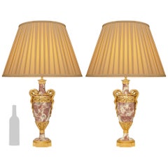 pair of French 19th century Louis XVI st. Pêcher marble and Ormolu lamps