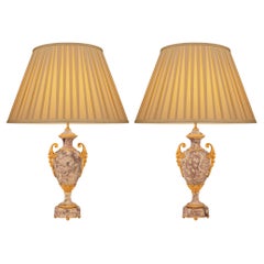 Paire de lampes en marbre de Pêcher et bronze doré de style Louis XVI du XIXe siècle