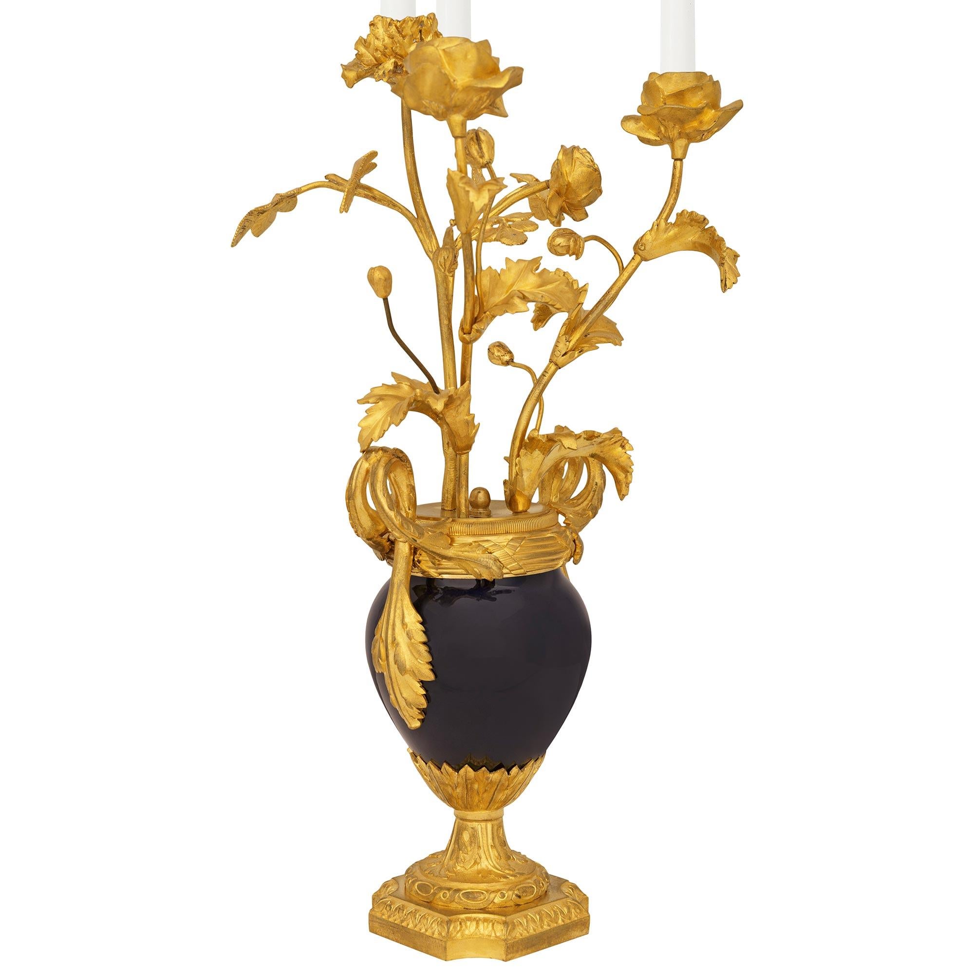 pair of French 19th century Louis XVI st. Porcelain and Ormolu candelabras In Good Condition For Sale In West Palm Beach, FL