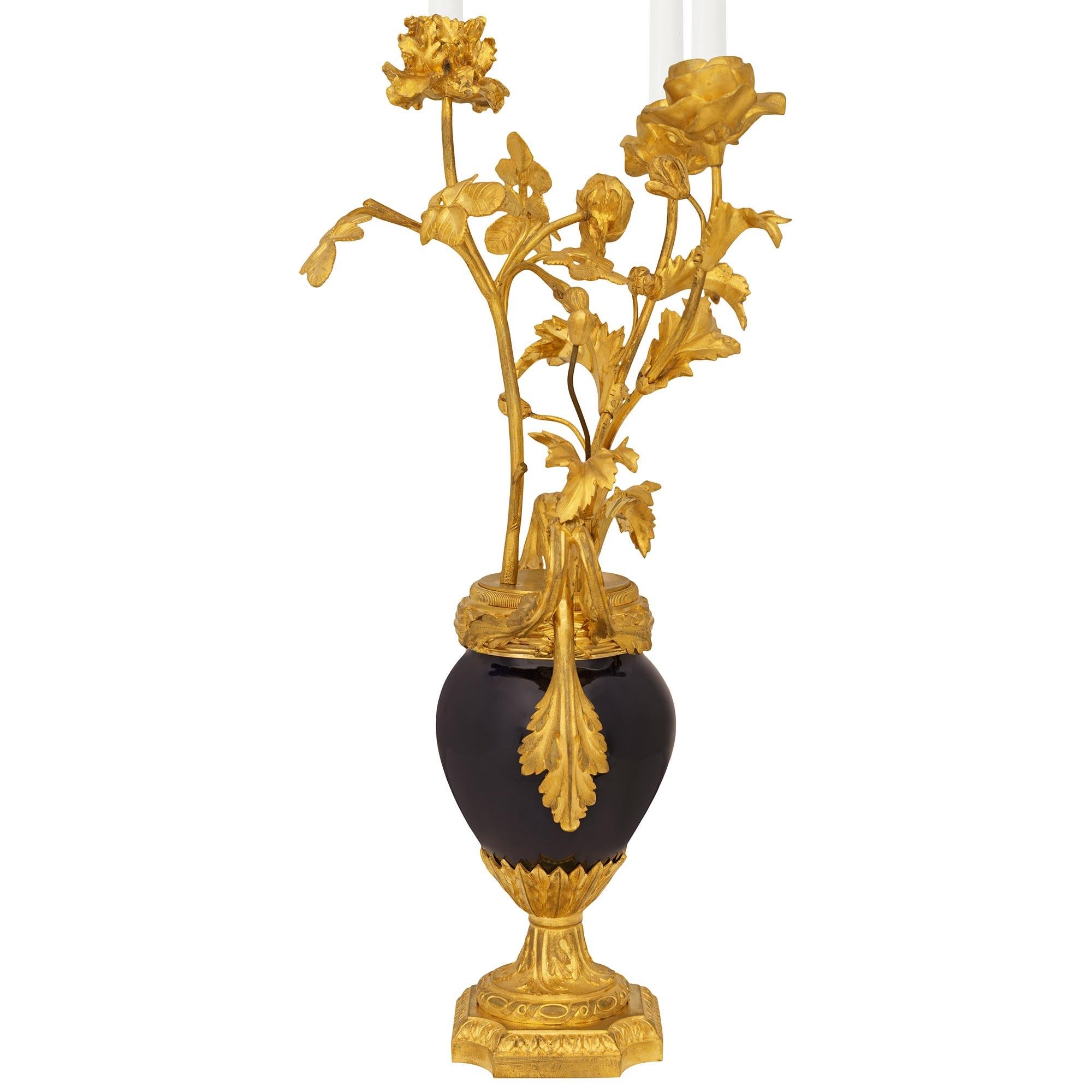 19th Century pair of French 19th century Louis XVI st. Porcelain and Ormolu candelabras For Sale