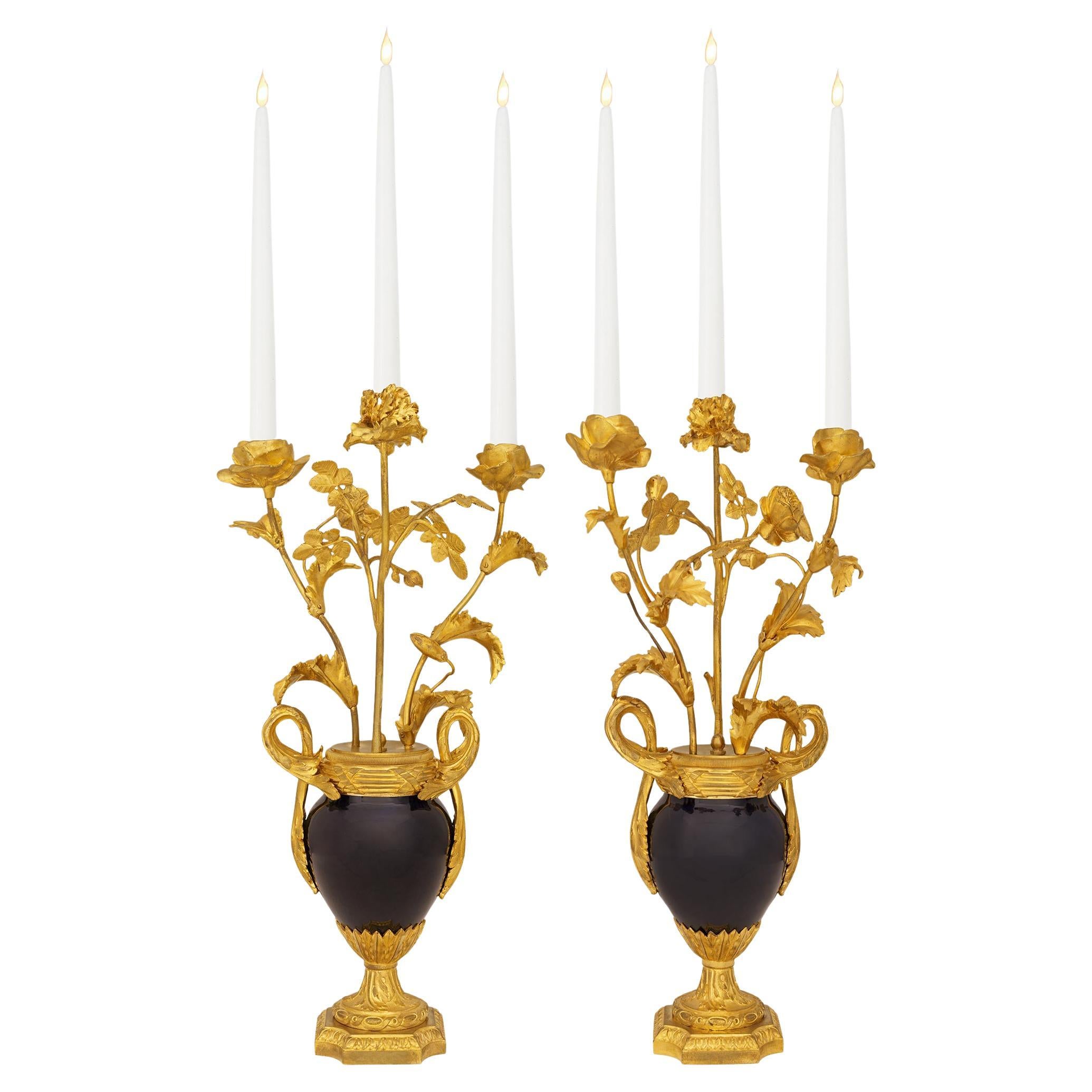 pair of French 19th century Louis XVI st. Porcelain and Ormolu candelabras For Sale