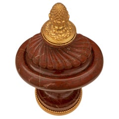 Pair of French 19th Century Louis XVI St. Rouge Griotte Marble and Ormolu Urns