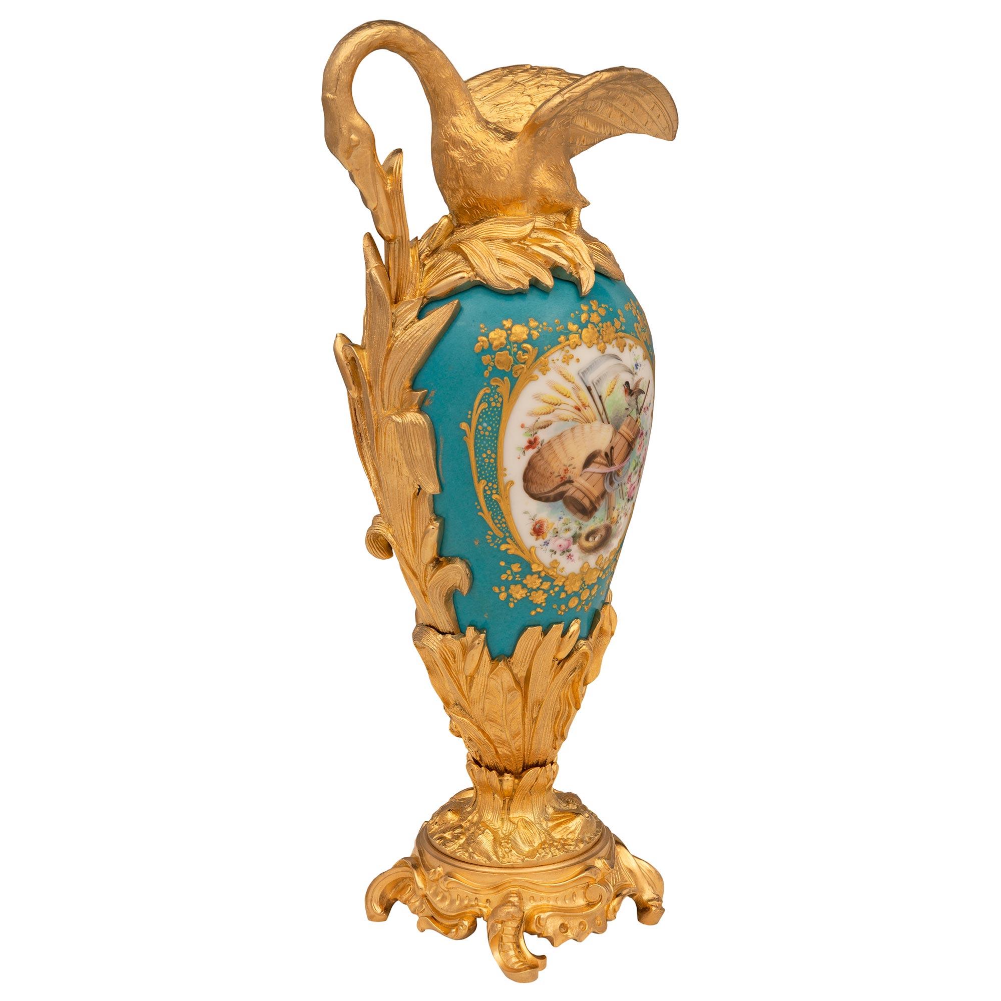 Pair of French 19th Century Louis XVI St. Sèvres Porcelain and Ormolu Ewers In Good Condition For Sale In West Palm Beach, FL