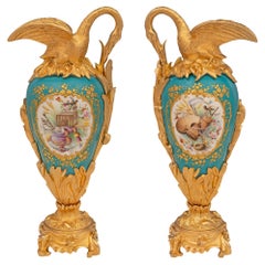 Pair of French 19th Century Louis XVI St. Sèvres Porcelain and Ormolu Ewers