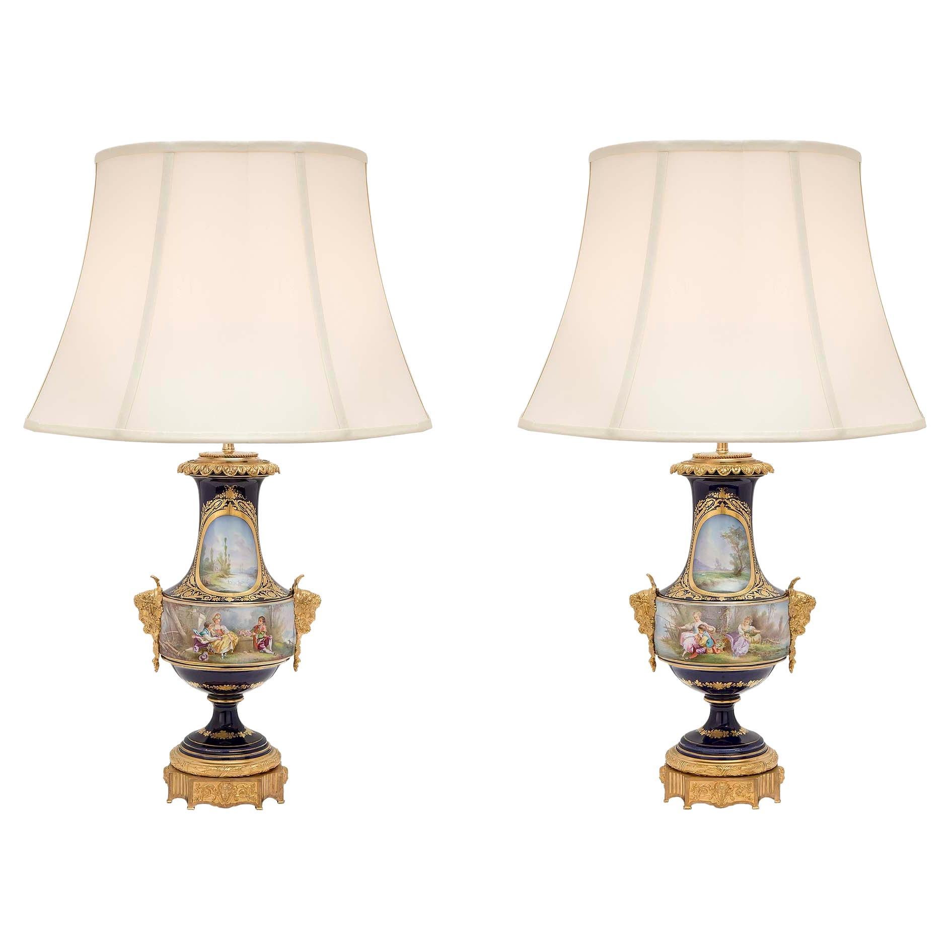 Pair of French 19th Century Louis XVI St. Sèvres Porcelain and Ormolu Lamps