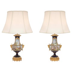 Pair of French 19th Century Louis XVI St. Sèvres Porcelain and Ormolu Lamps