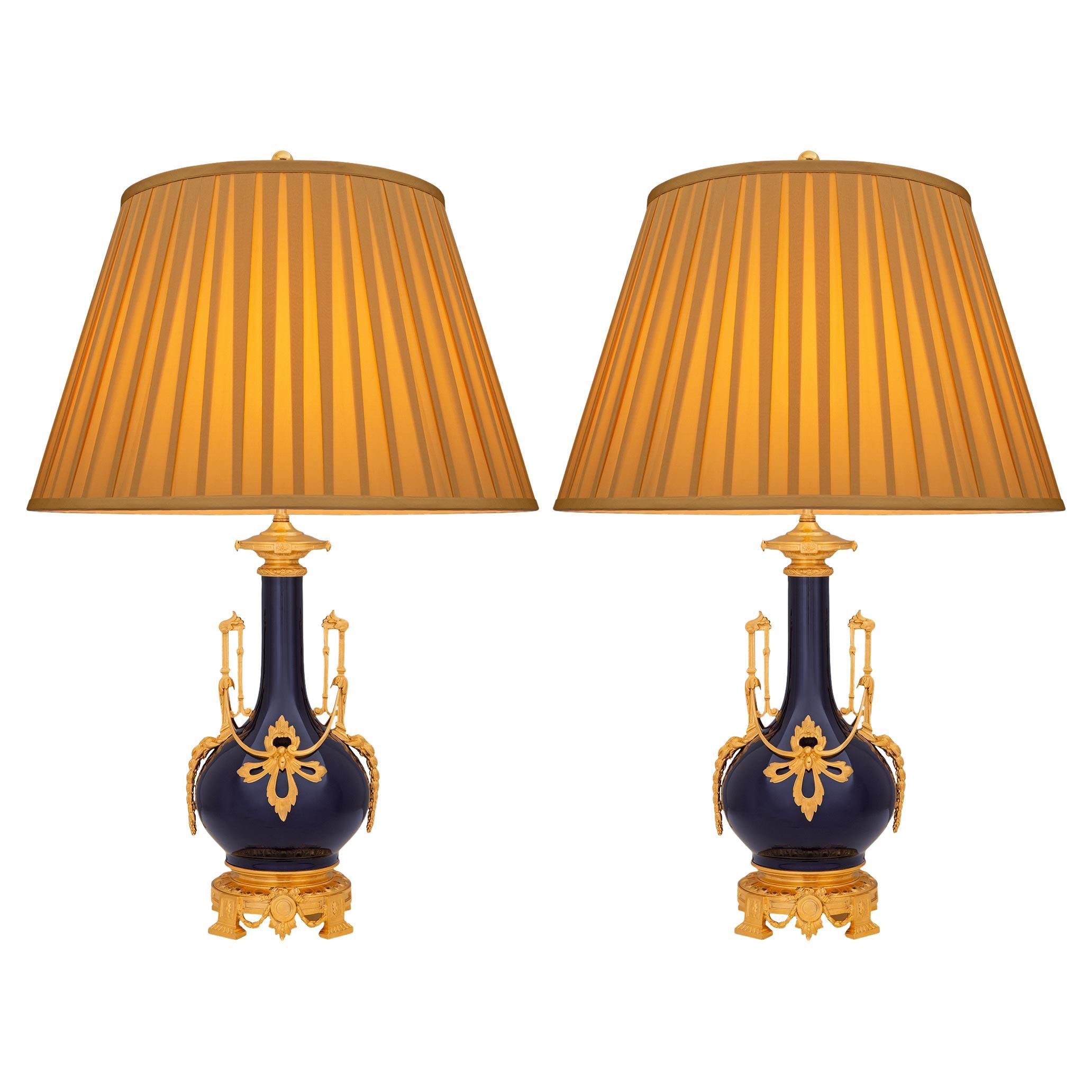 pair of French 19th century Louis XVI st. Sévres Porcelain and Ormolu lamps