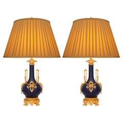 pair of French 19th century Louis XVI st. Sévres Porcelain and Ormolu lamps