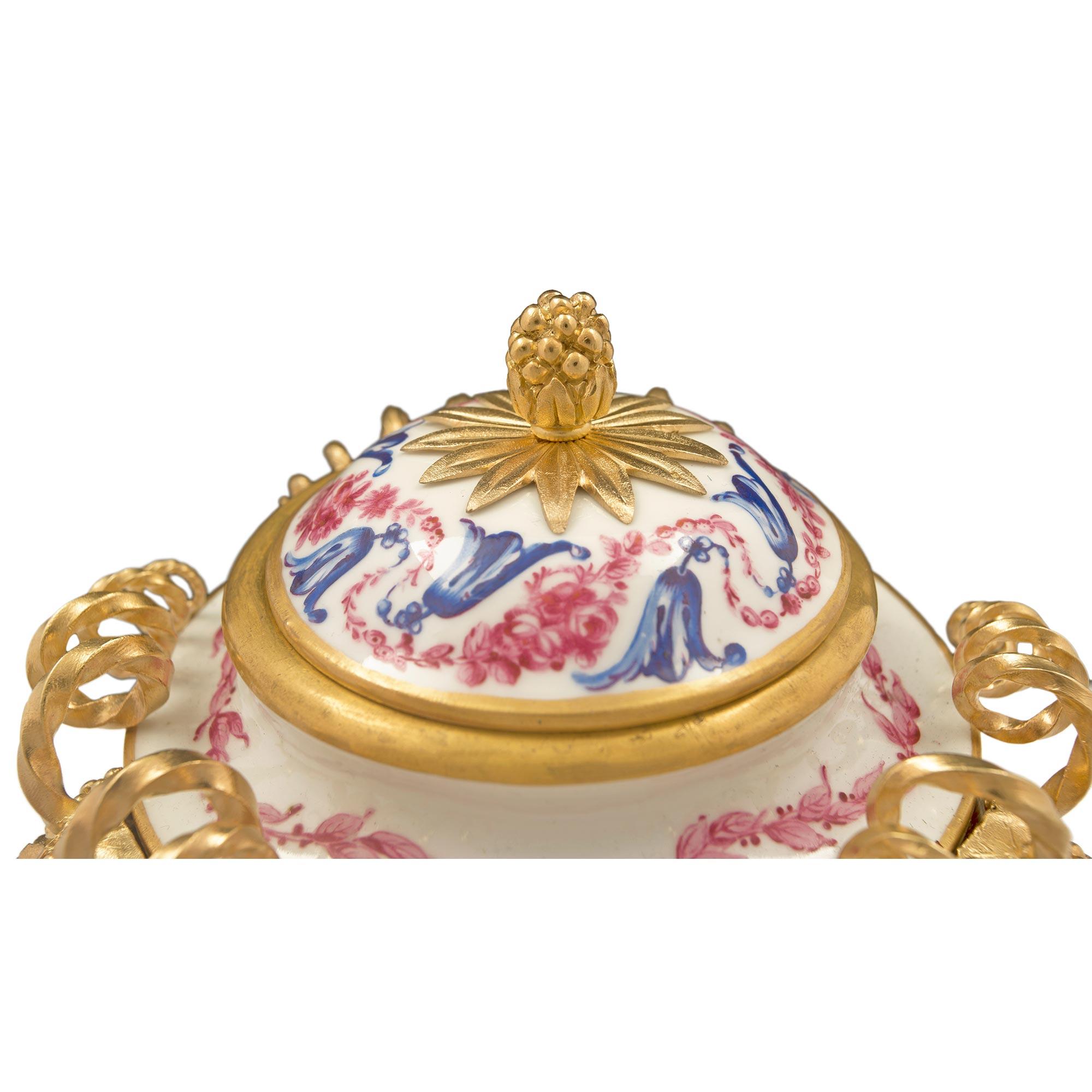 Pair of French 19th Century Louis XVI St. Sèvres Porcelain and Ormolu Lidded Urn For Sale 1