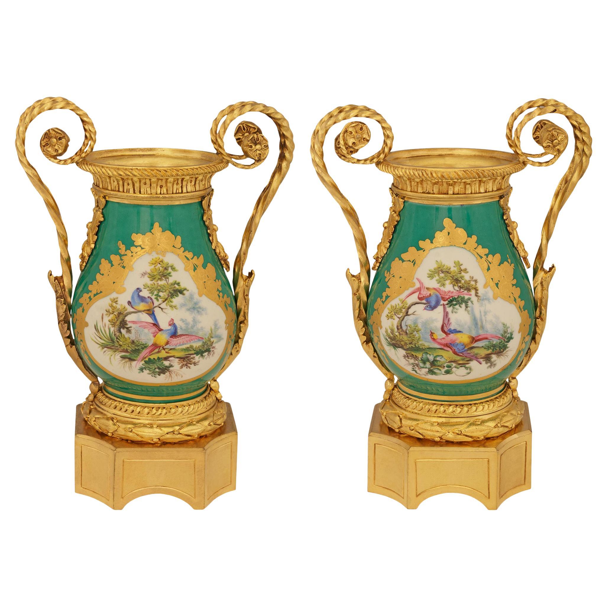 pair of French 19th century Louis XVI st. Sévres Porcelain and Ormolu urns
