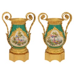 pair of French 19th century Louis XVI st. Sévres Porcelain and Ormolu urns