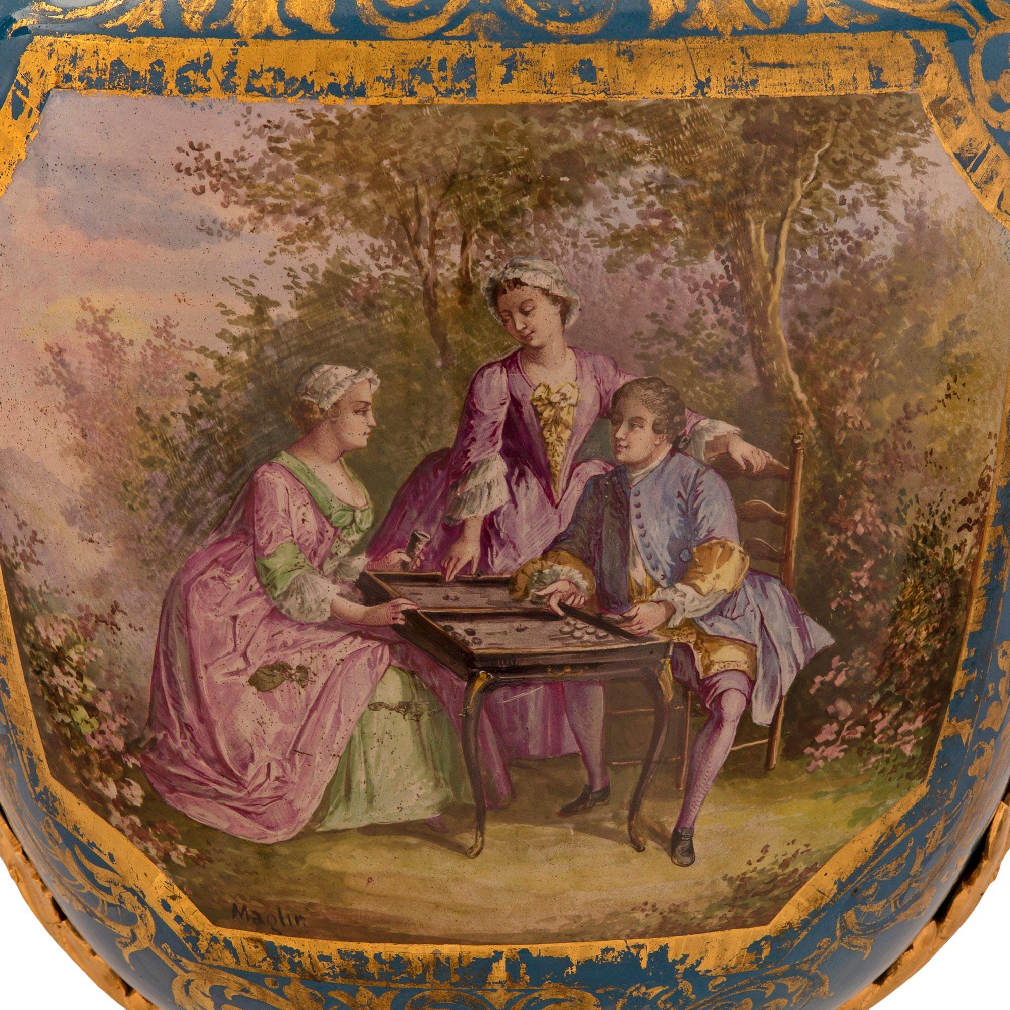 Paire de vases en porcelaine et bronze doré Louis XVI de St. Svres du 19ème siècle français 4