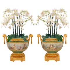 Pair Of French 19th Century Louis XVI St. Sèvres Porcelain and Ormolu Vases
