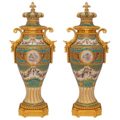 Pair of French 19th Century Louis XVI St. Sèvres Porcelain & Ormolu Lidded Urns