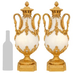 pair of French 19th century Louis XVI st. white Carrara marble and Ormolu urns