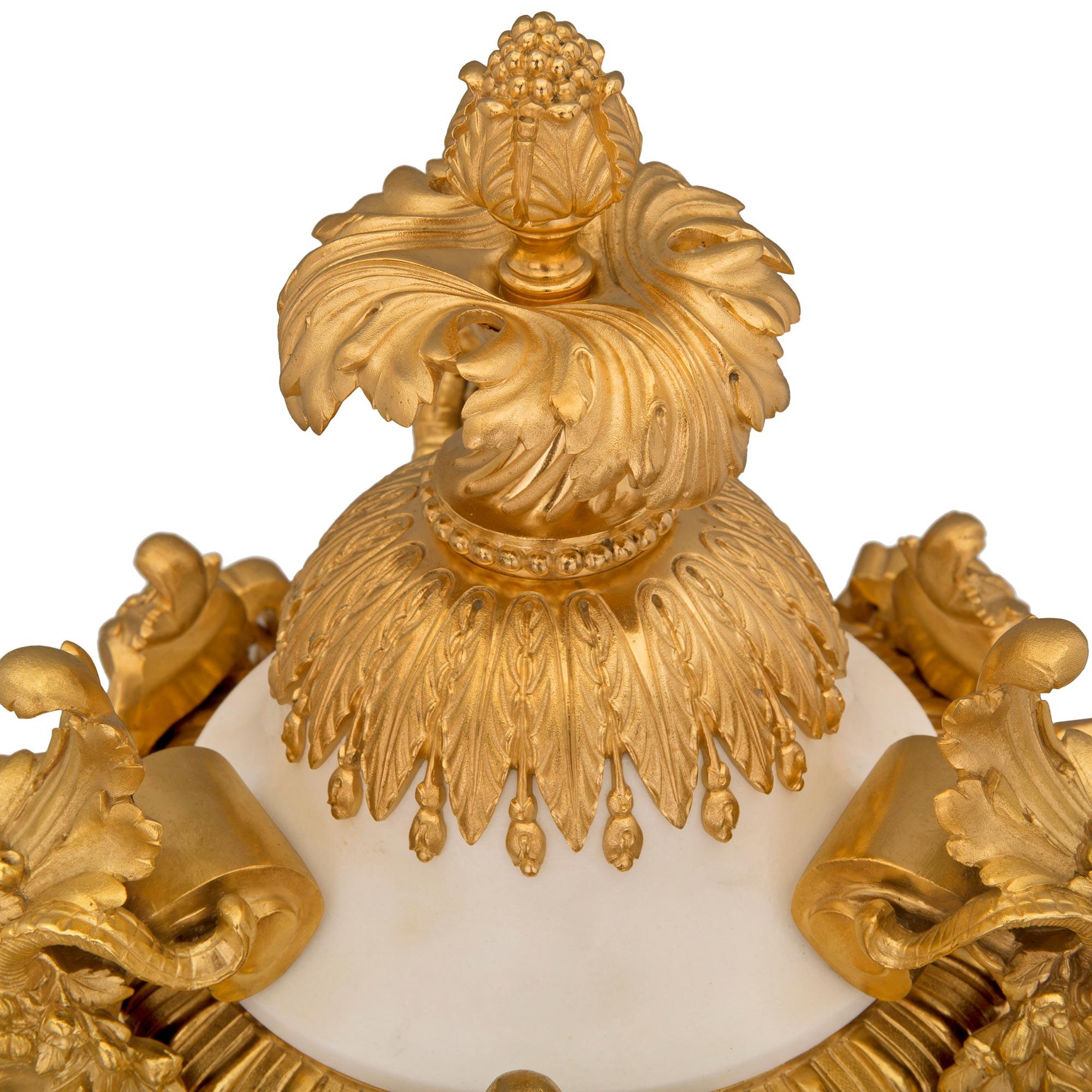 Belle Époque Pair of French 19th Century Louis XVI St. White Carrara Marble and Ormolu Urns For Sale