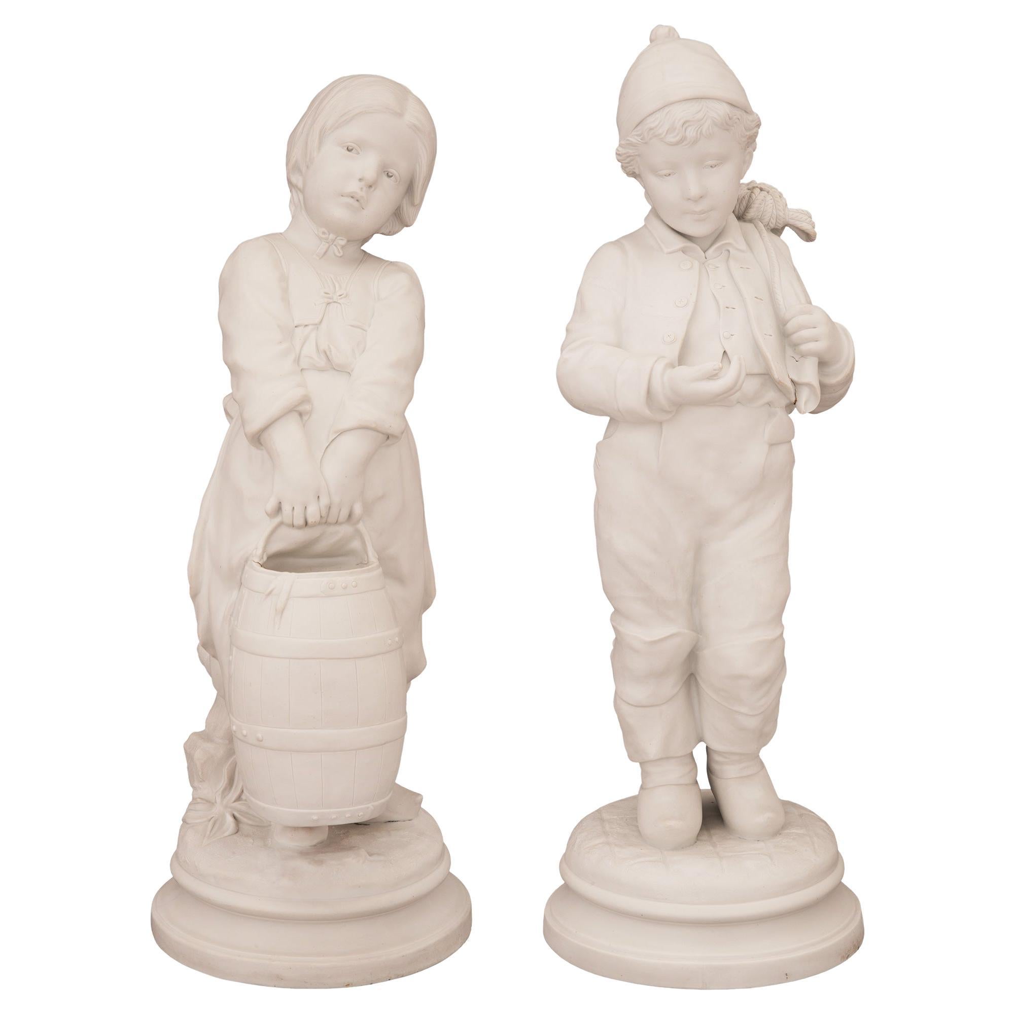 Pair of French 19th Century Louis XVI Style Biscuit de Sèvres Porcelain Statues For Sale