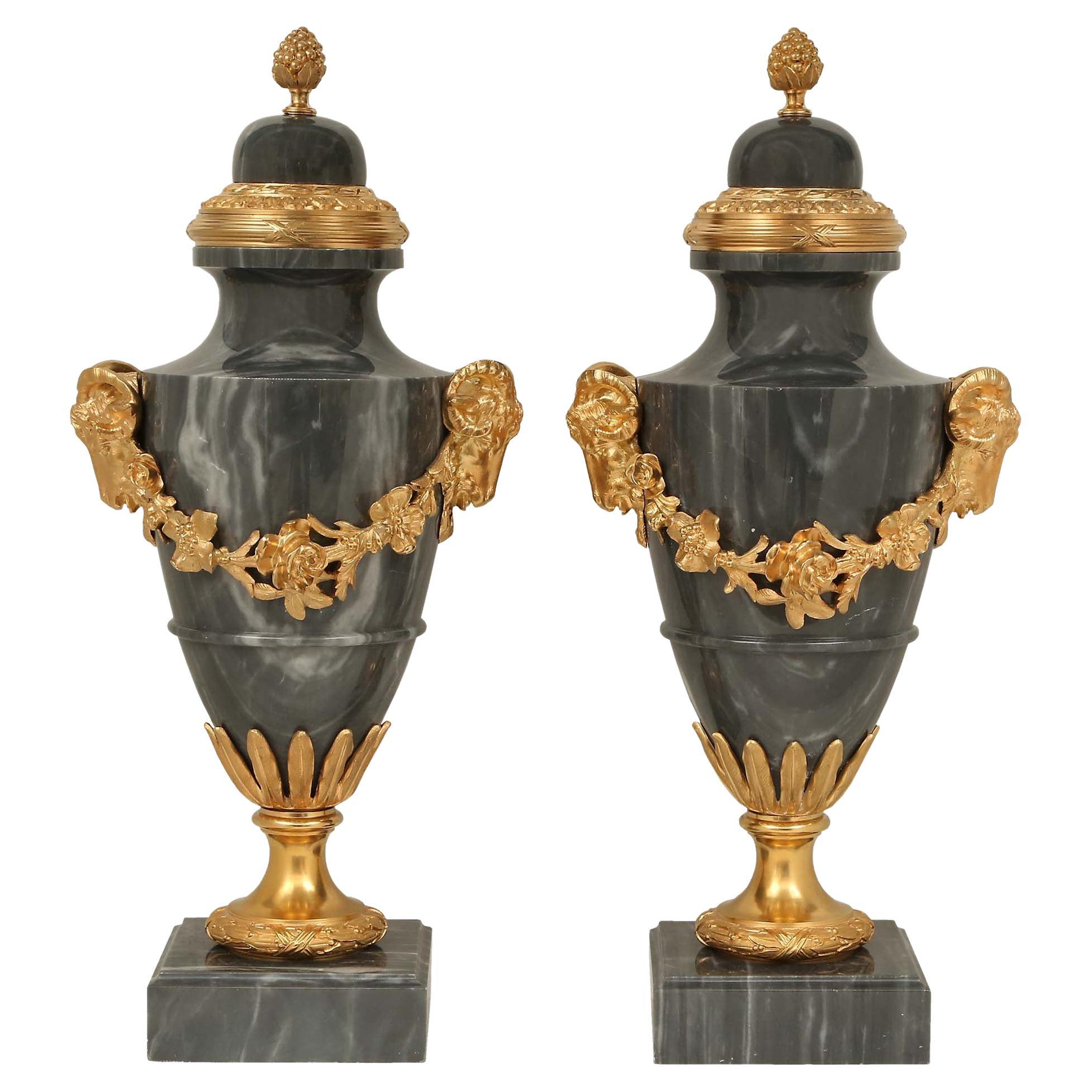 Pair of French 19th Century Louis XVI Style Blue Turquin Marble and Ormolu Urns For Sale