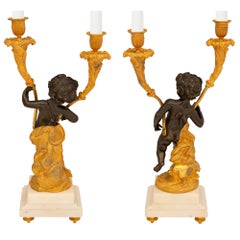 Coppia di candelabri francesi del XIX secolo in stile Luigi XVI in bronzo e marmo
