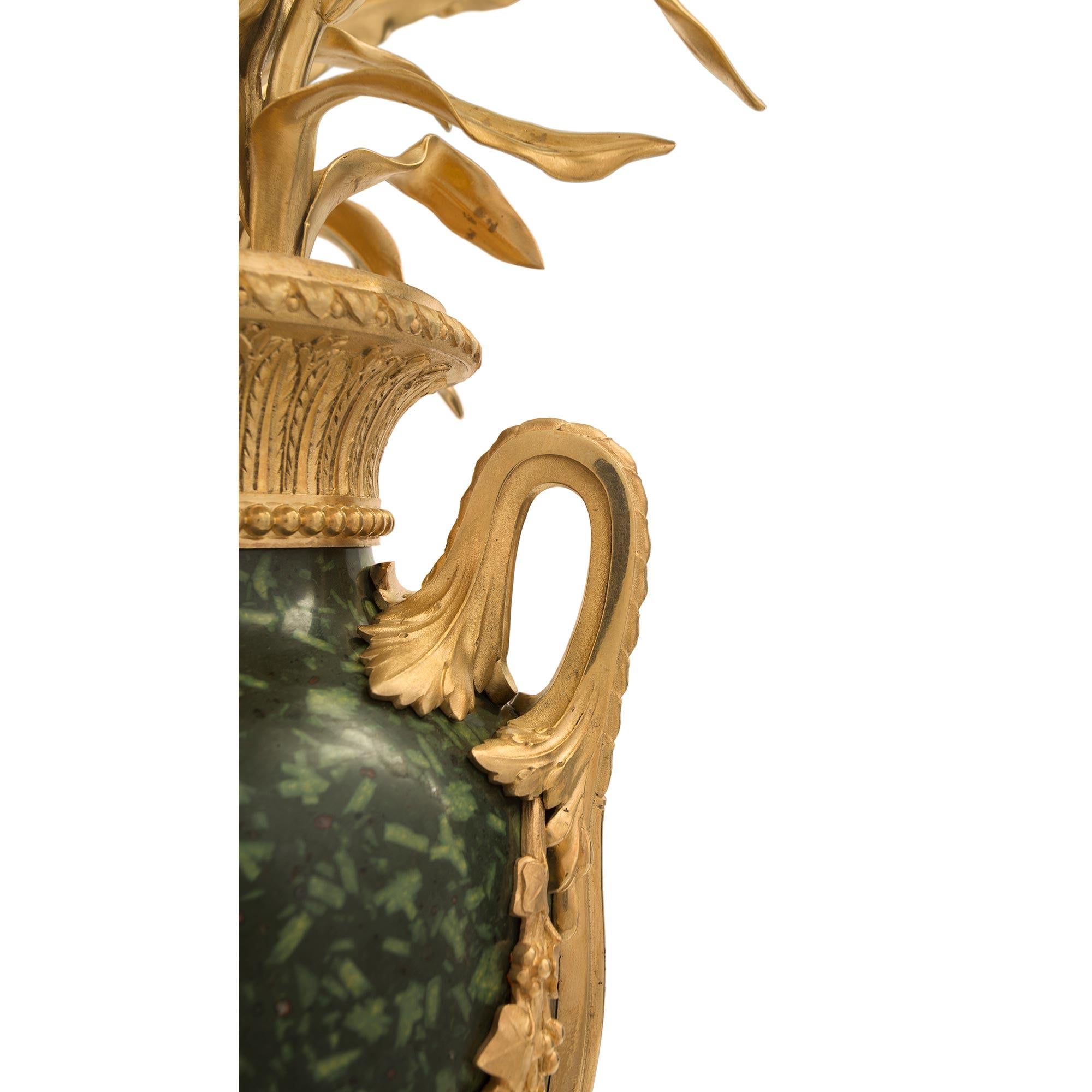 Similoro Pair of French 19th Century Louis XVI Style Four-Arm Candelabras in vendita