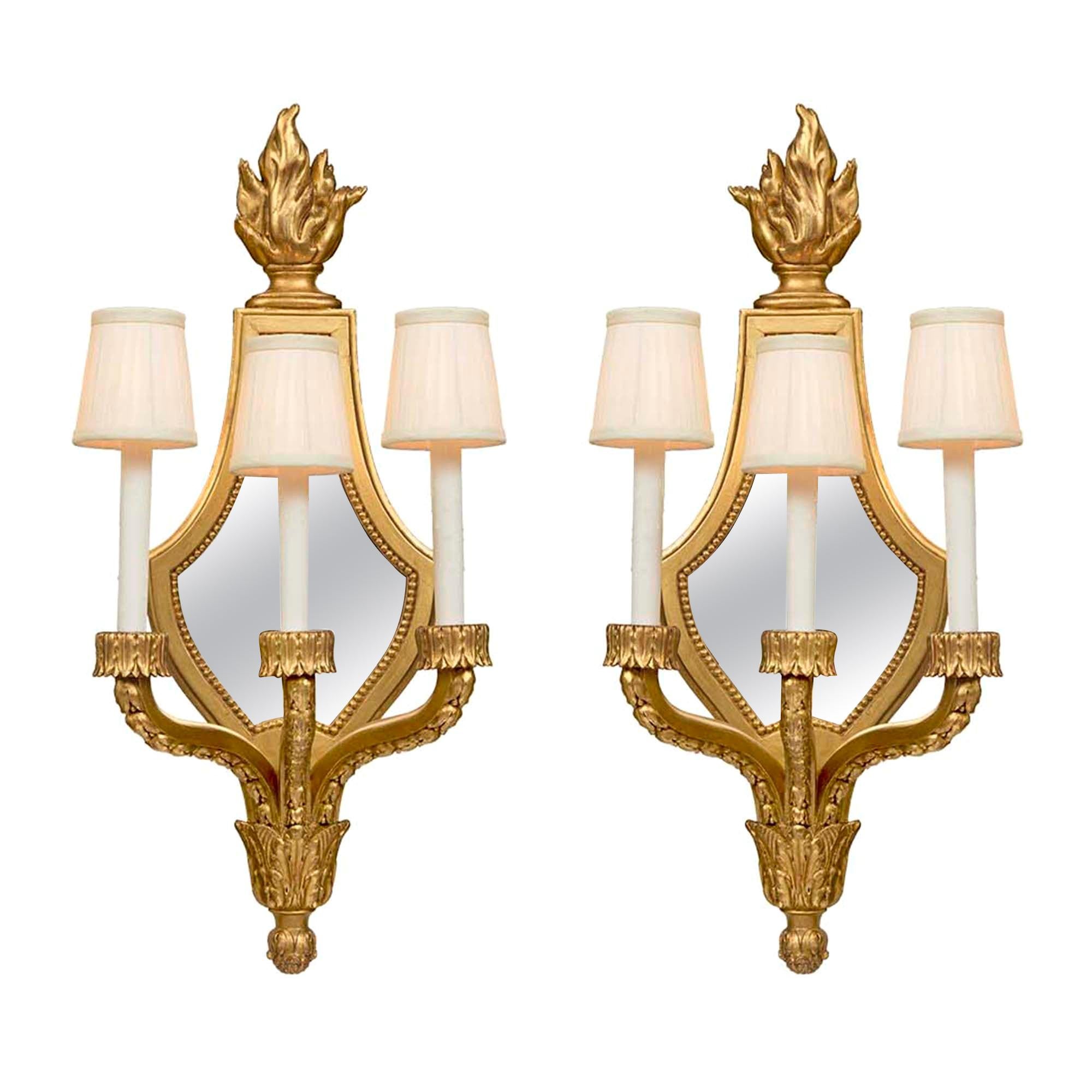 Pair of French 19th Century Louis XVI Style Giltwood Mirrored Sconces For Sale