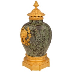 Pair of French 19th Century Louis XVI Style Marble and Ormolu Lidded Urns