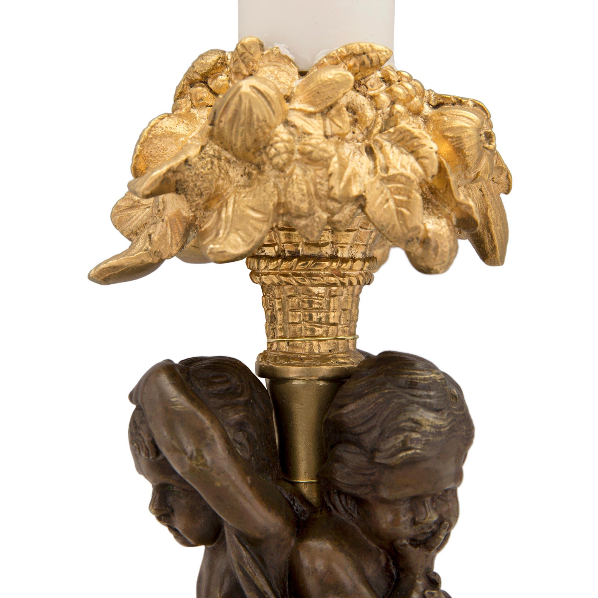 Pair of French 19th Century Louis XVI Style Ormolu and Bronze Lamps In Good Condition For Sale In West Palm Beach, FL