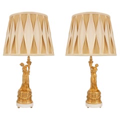 Pair of French 19th Century Louis XVI Style Ormolu and Carrara Marble Lamps